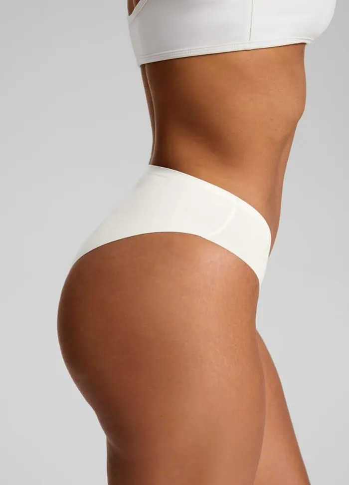 Perfil de una silueta femenina en ropa interior clara